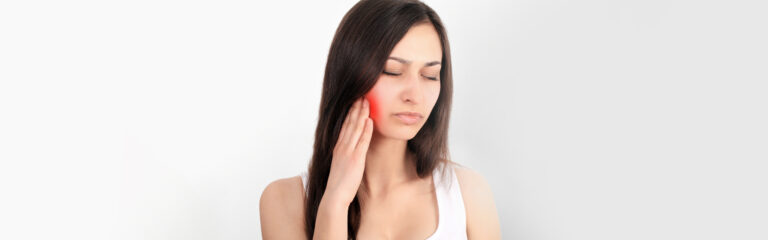 A lady having tooth pain