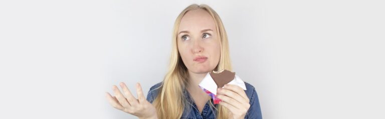 A girl eating dark chocolate