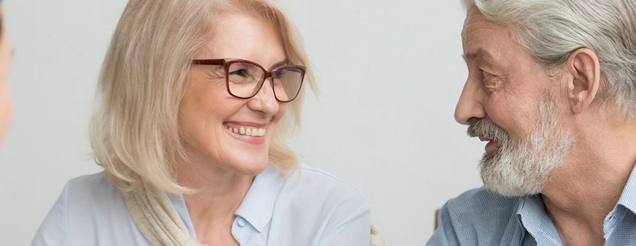 A couple discussing with dentist