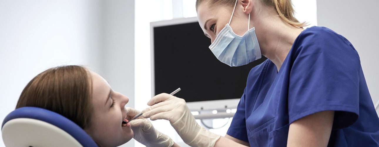 A lady with a dentist