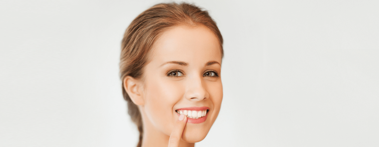 A girl showing her teeth
