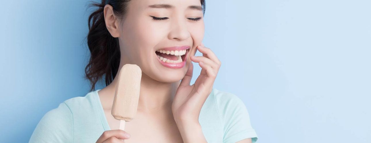 A lady with sensitive teeth